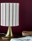 Tischlampe messing und gestreifter Leinenschirm