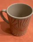 Tasse mit Farn