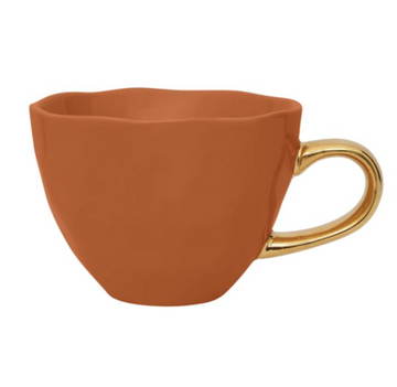 Tasse gross mit goldenem Henkel